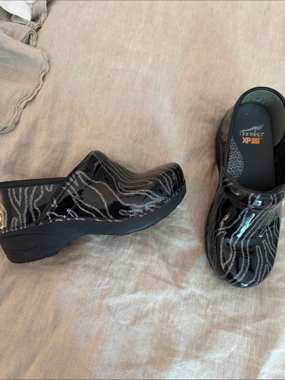 Dansko Black Patent Slip-On Clogs with Silver Zebra Stripes - Picture 2 of 4